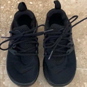 Boys all black Nike sneaker